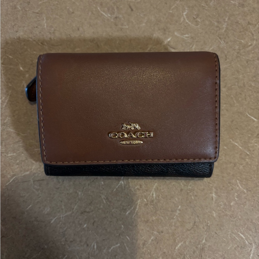 Coach Micro Wallet in the color Redwood